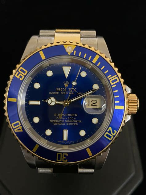 gold and black rolex sub mariner|blue gold Rolex Submariner price.